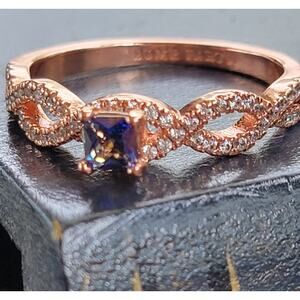 Rose Gold Plated Infinity Knot Ring with Simulated Sapphire - Size 10
